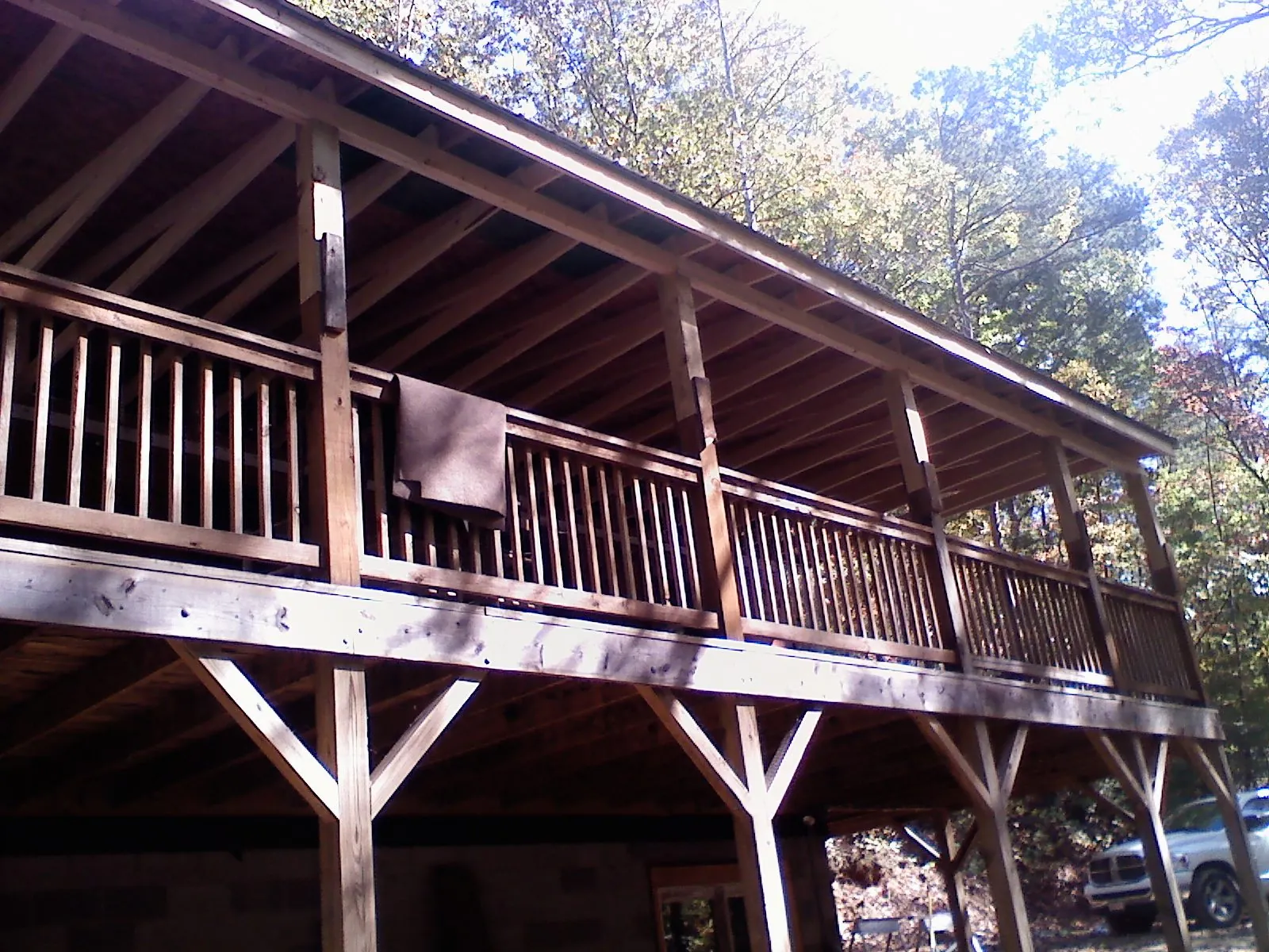 Timber framing under a new elevated porch and deck — Roof Leak Repair in Destin by Roofing Brothers